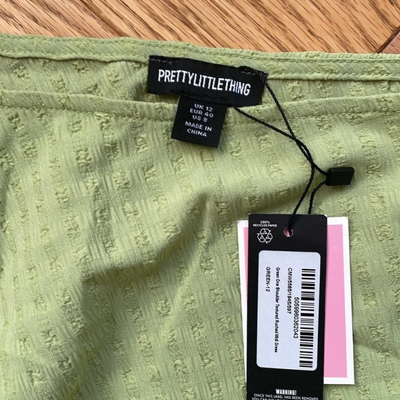 Green asymmetrical dress, size 12 - Picture 2 of 3